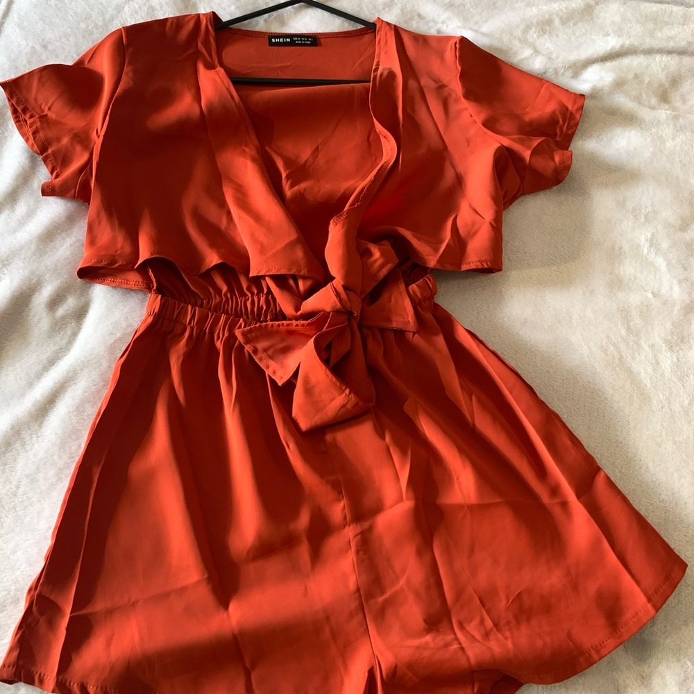 Romper with front tie.